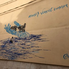 murales su di una parete di Casa Accoglienza S. Maria Goretti