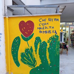 Al lavoro sul murale "Rimbellarsi"